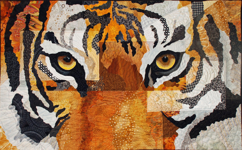 Pointless Sisters' Art Quilt group member quilt by Cheri Gooler, titled Eye of the Tiger.  Occidental Center for the Arts 2022